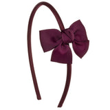 Diadema con lazo burdeos