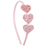 Diadema corazones rosa