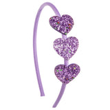 Diadema corazones morado