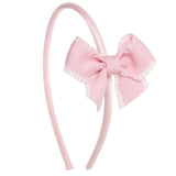 Diadema bebé con lazo rosa pastel