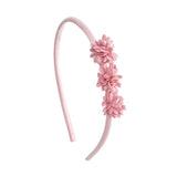 Diadema con tres florecitas rosa