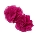 Clip con flores fucsia