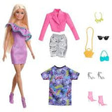 Barbie Fashionista con 3 modas noche.