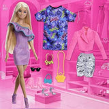 Barbie Fashionista con 3 modas noche.