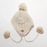 Gorro orejeras beige